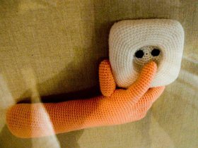 I m not sure why they had a knitted hand putting i.jpg